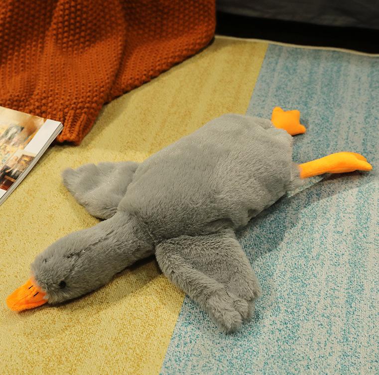 gray Goose Doll Pillow on the floor 